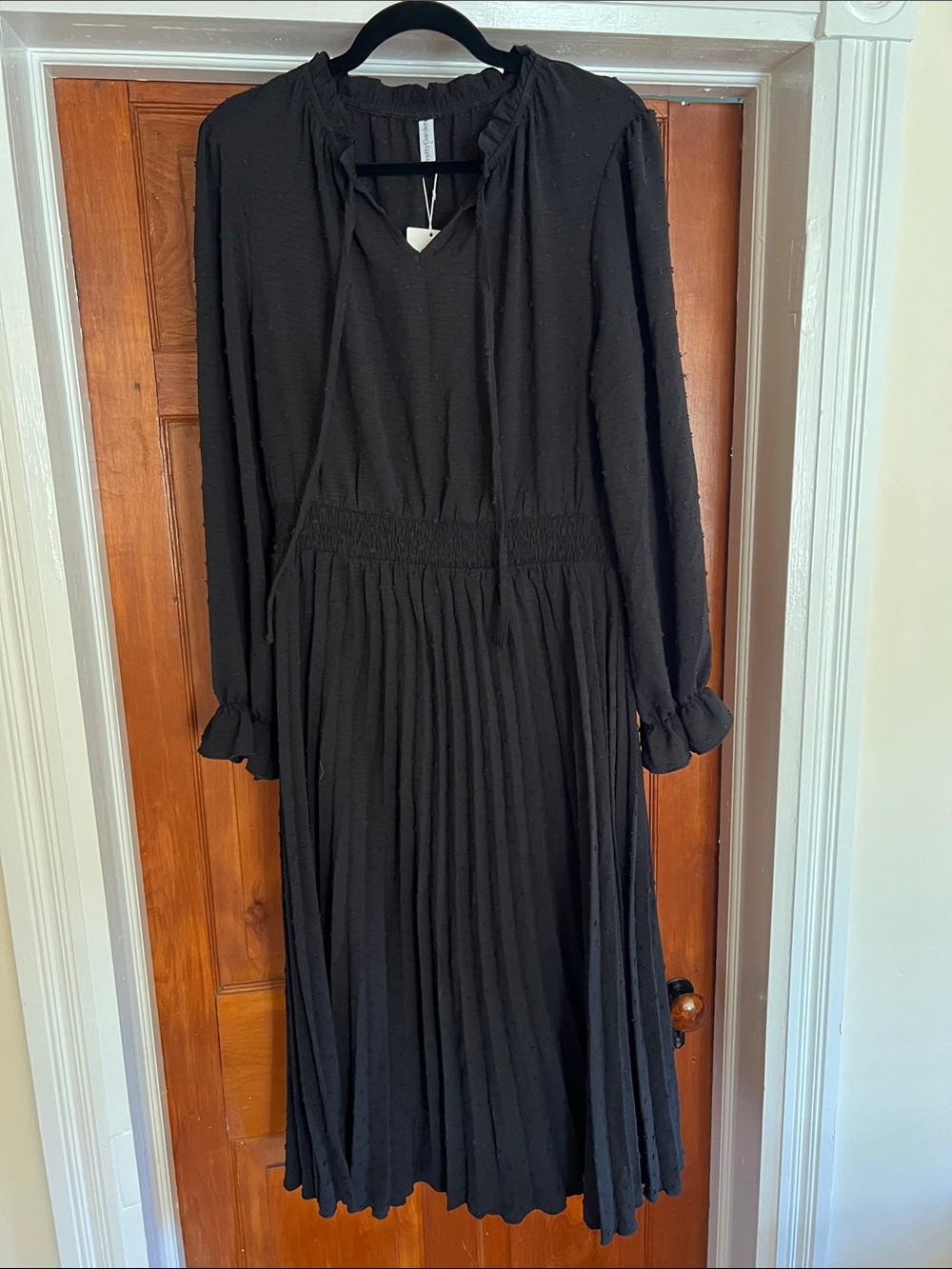 Black Swiss Dot Midi Dress with Smocked Waist and Ruffle Details